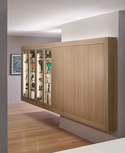 A wall mounted cabinet with glass doors and shelves.
